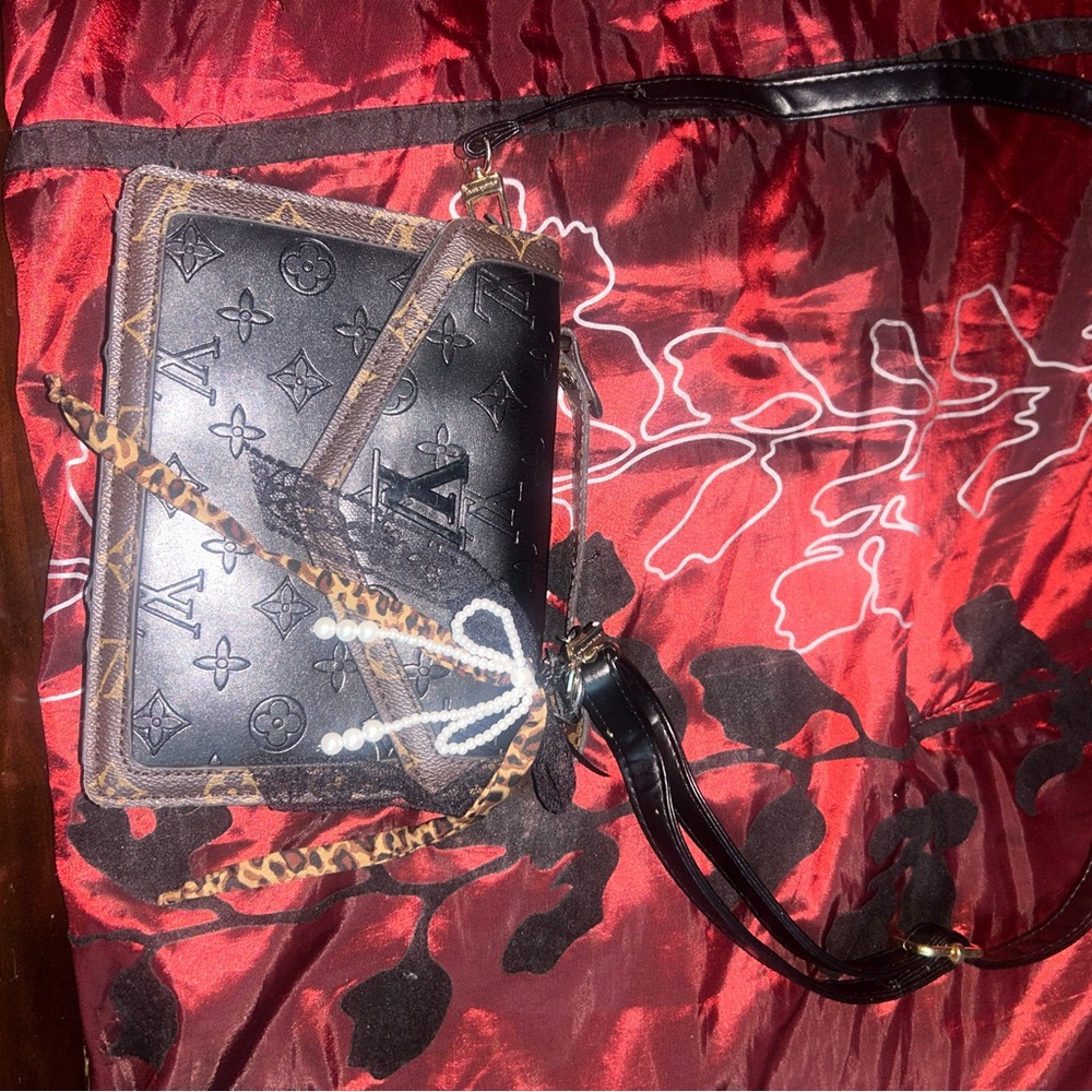 Louis Vuitton Black and Brown Crossbody Bag with Vintage Appeal